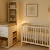 A well-organized, compact nursery with mini crib and storage, illustrating smart baby gear solutions.